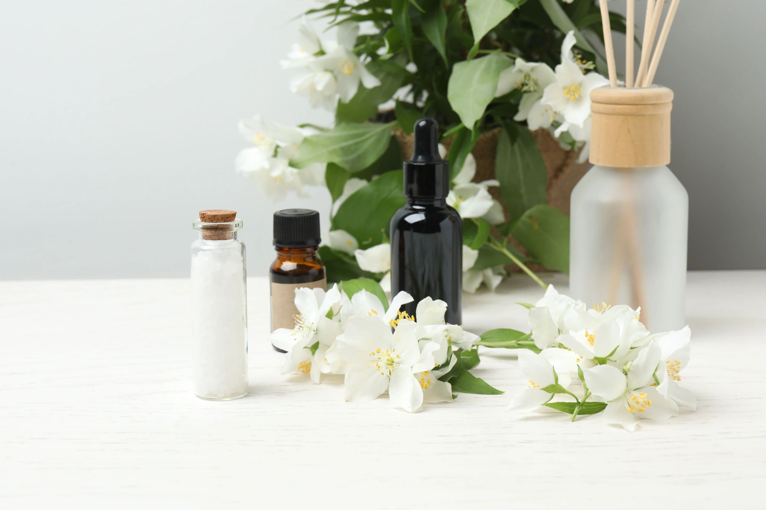 Jasmine flowers, tea, essential oils with space for text